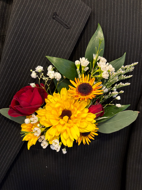Wedding boutonniere on a tux lapel