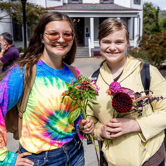 College students with bouquets made from the flower bar