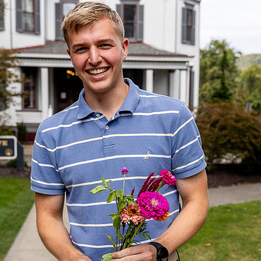 College studentswith bouquets made from the flower bar